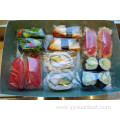 Automatic packing machine for sushi